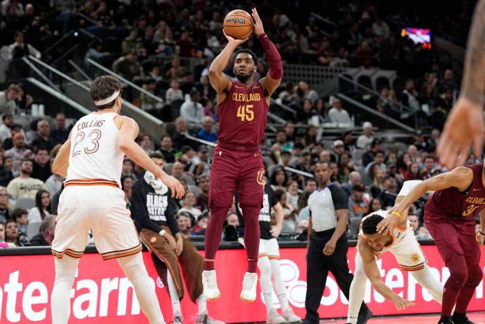 Feb 3, 2024; San Antonio, Texas, USA; Cleveland Cavaliers guard Donovan Mitchell (45) shoots during the second half against the San Antonio Spurs at Frost Bank Center.